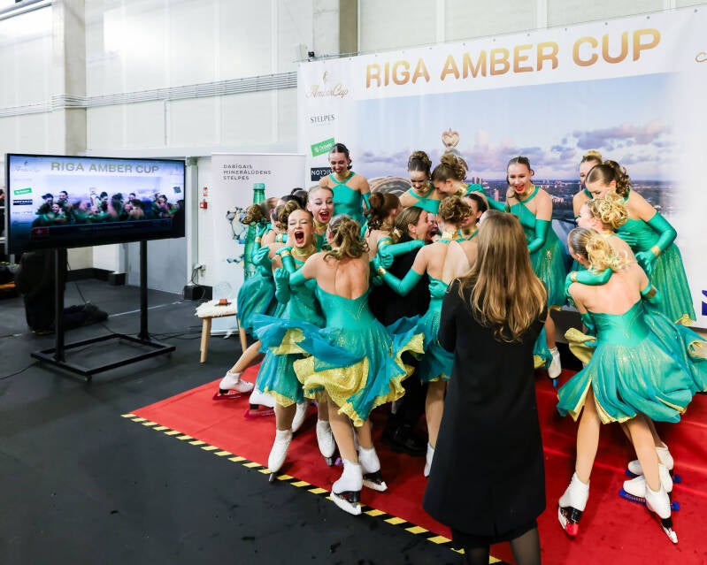 Pure joy! Team Cool Dreams Junior celebrating a new Season's Best in the short program. Captured by Robert Voskans