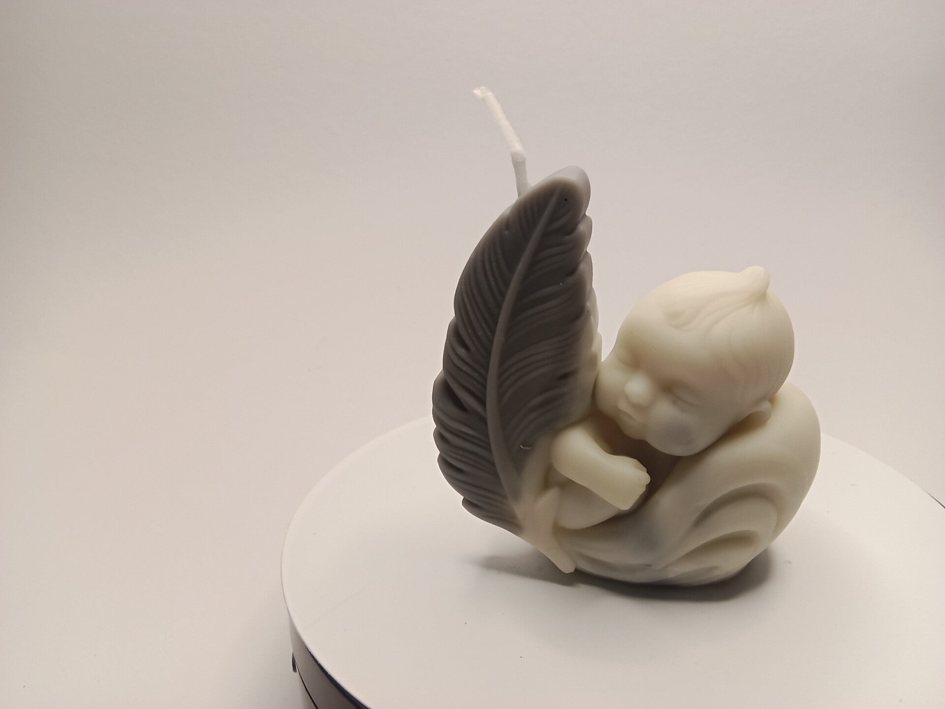 Kerze Baby mit Feder