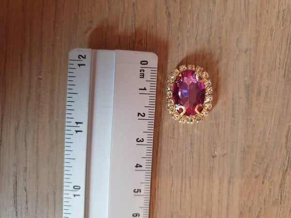 Rhinestone donkerroze met goude basis