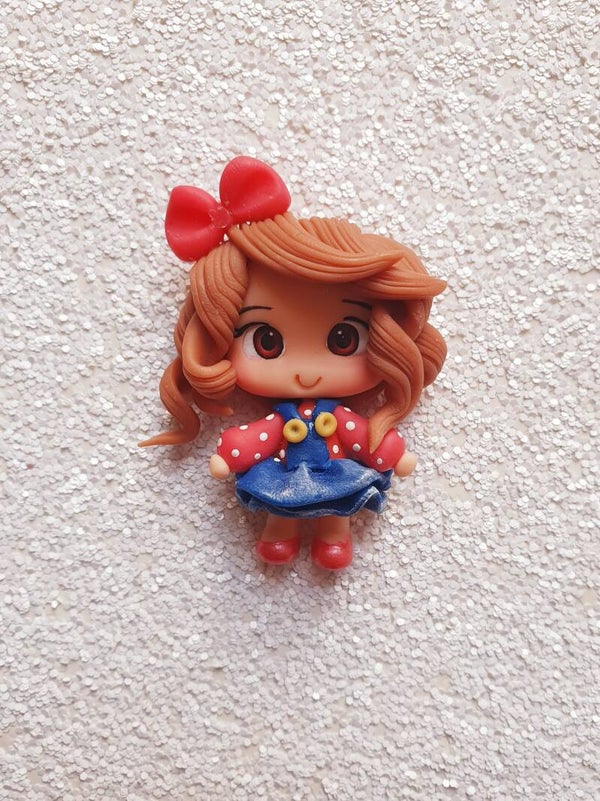 Meisje met rode strik