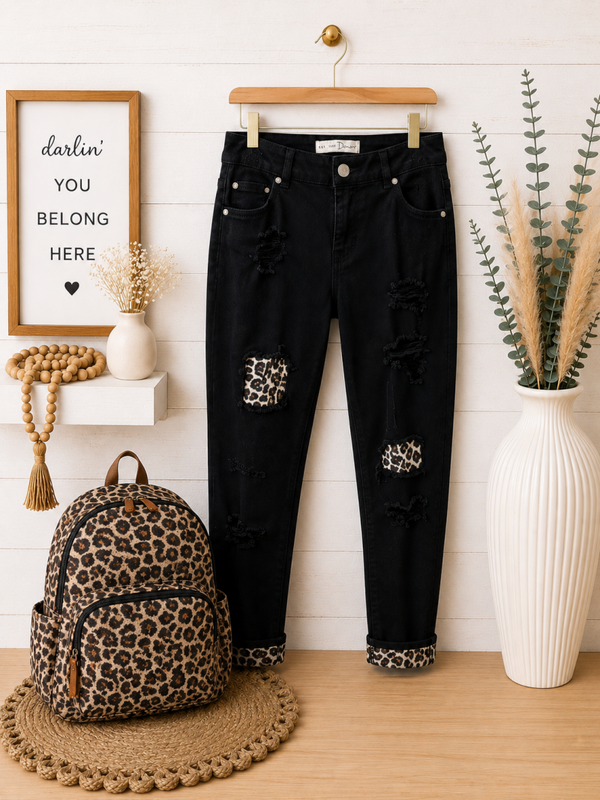 Cato black denim jeans with cheetah accent Size 4