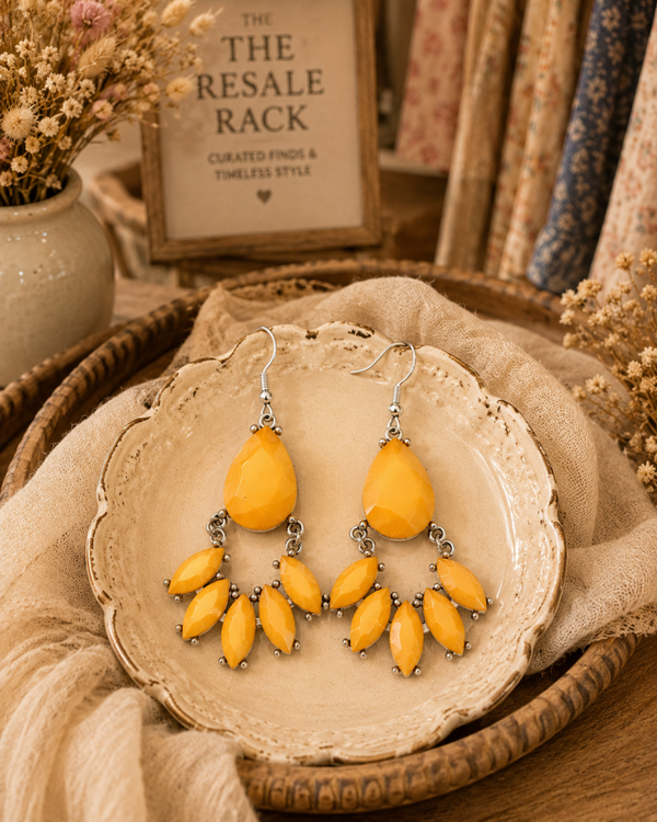 Yellow tear drop style earrings