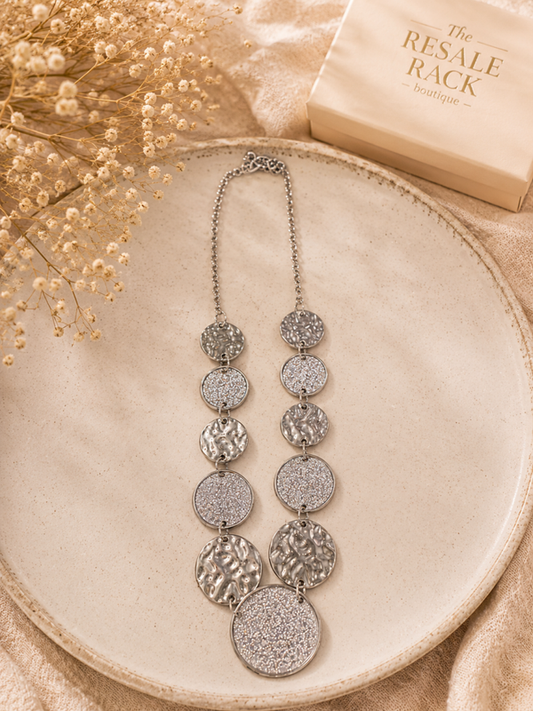 Silver tone hammered metal look necklace