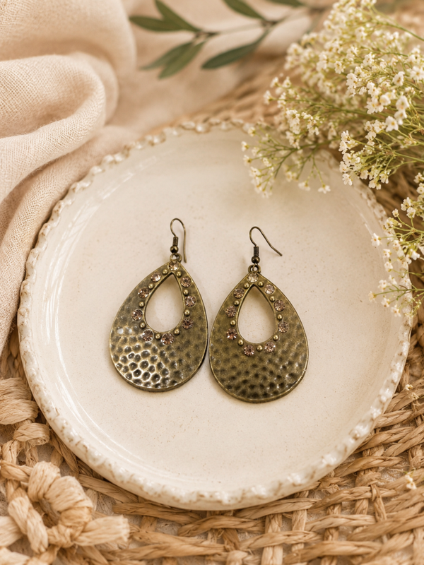 Gold tone hammered teardrop earrings