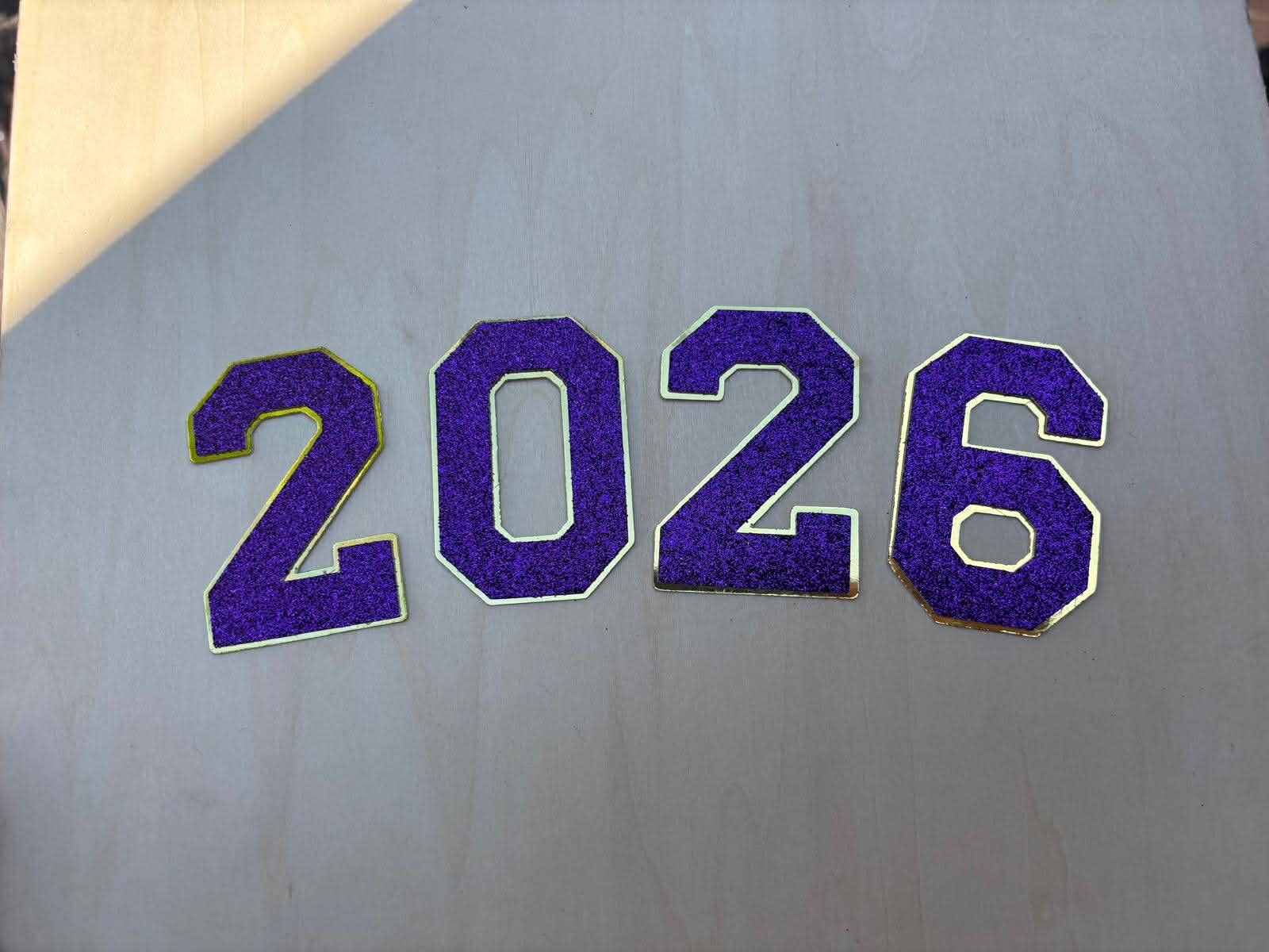 2026 GOLD/PURPLE