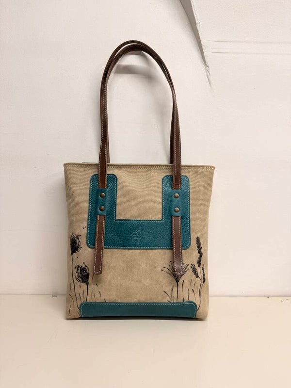 Iris | Sabbia, azzurro e marrone
