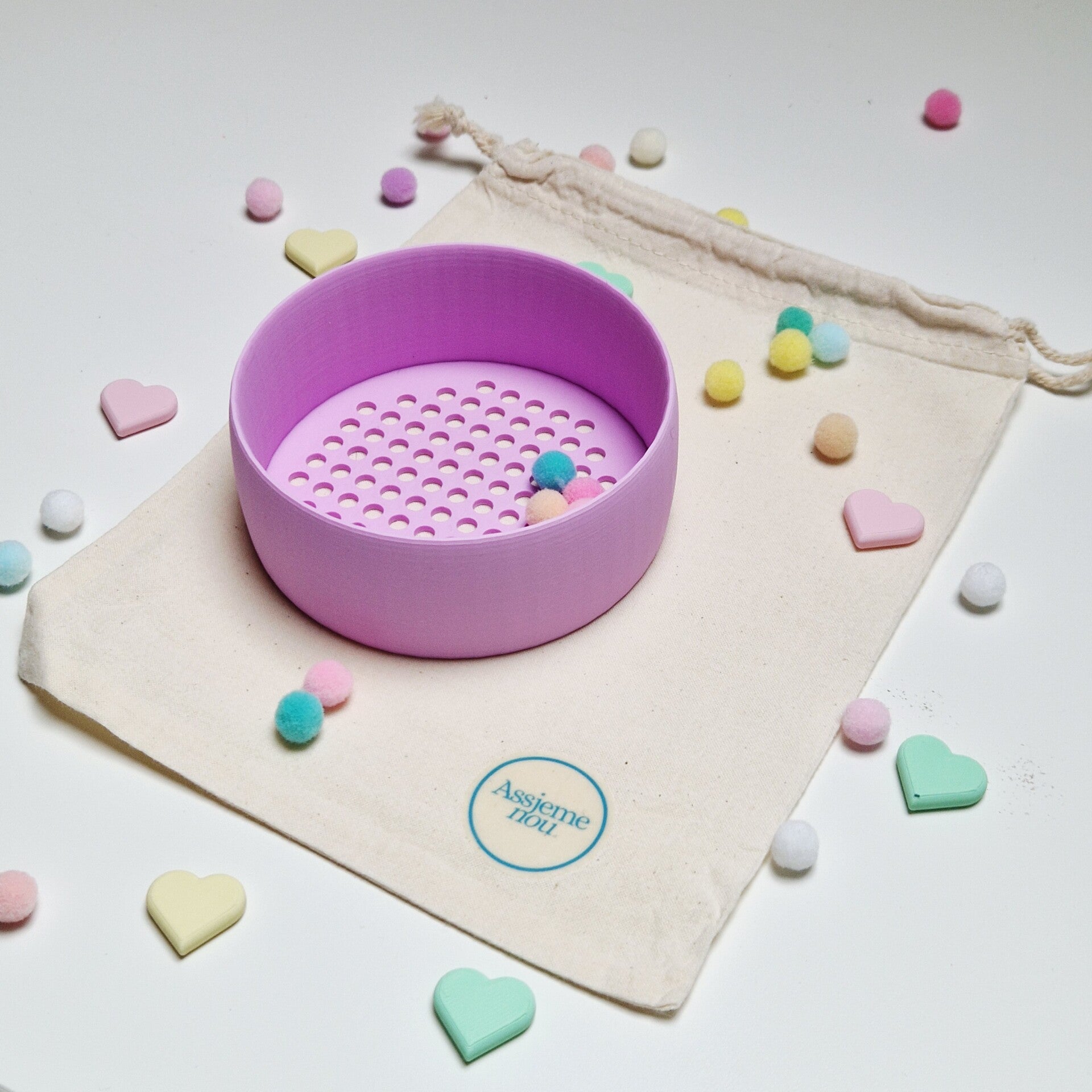 Zeefje voor in de sensorische speelbak Lila Roze