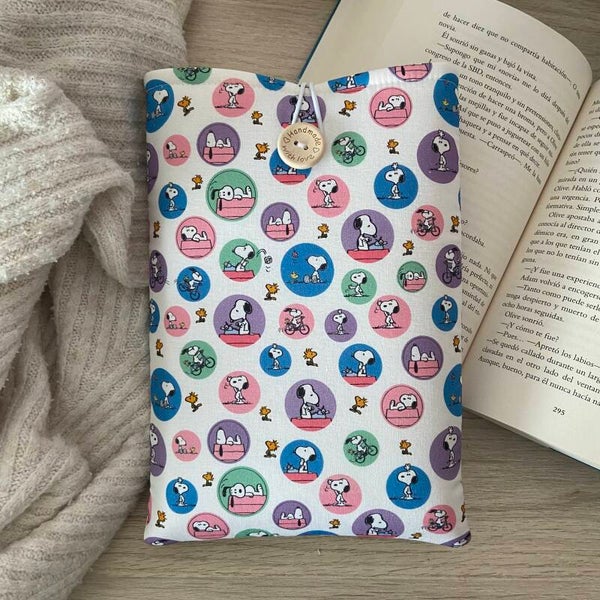 Funda literaria Snoopy en la vida