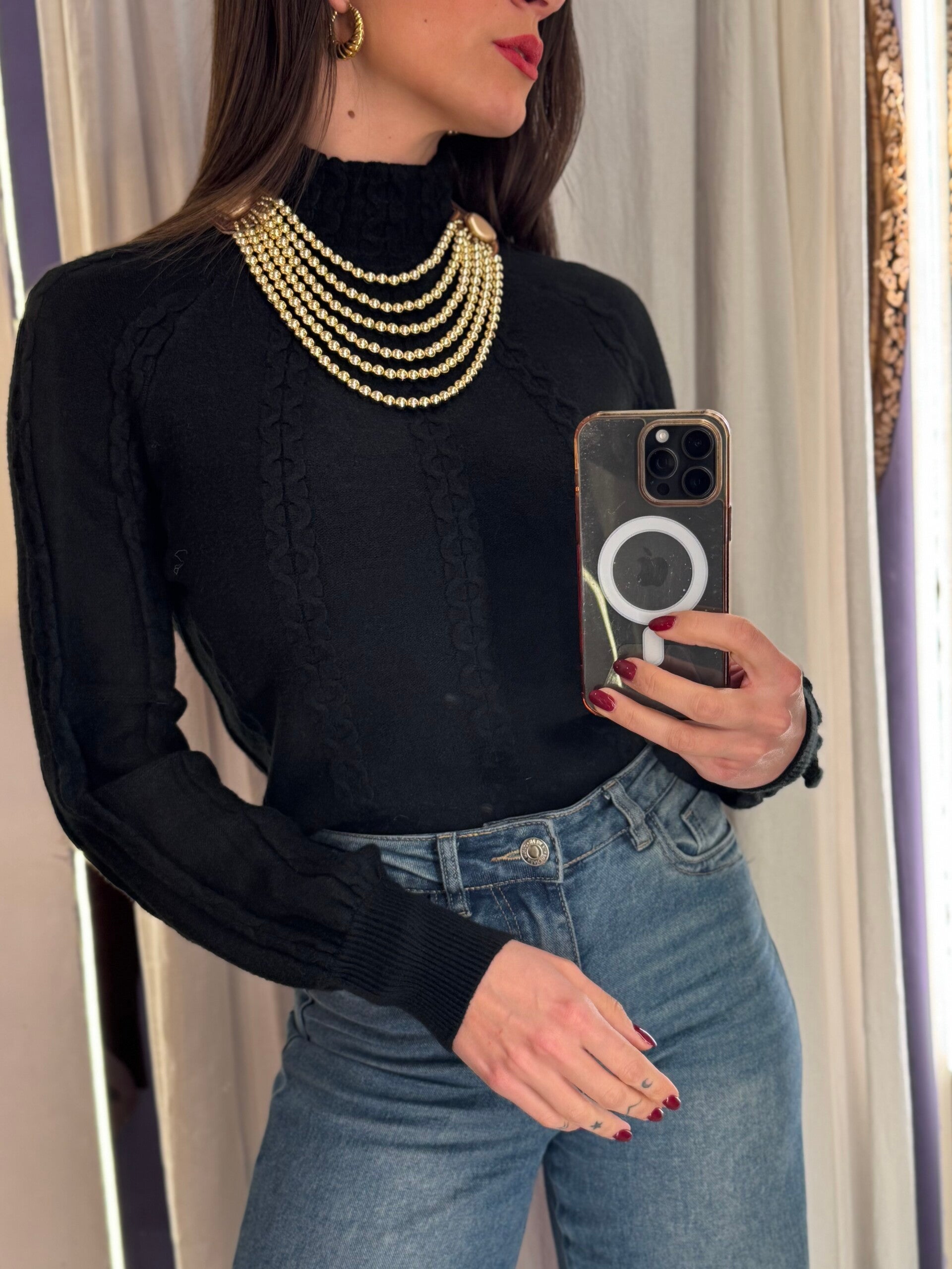 Dolcevita con trecce nero -20%