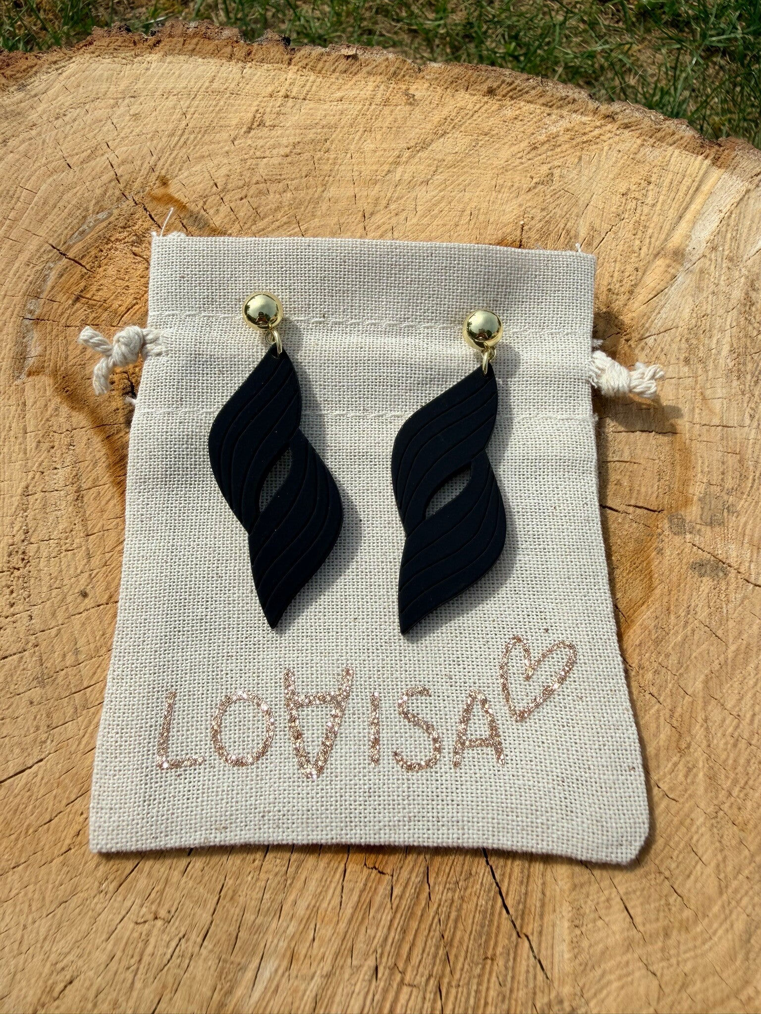 Boucles d’oreilles pendantes noir sculpté