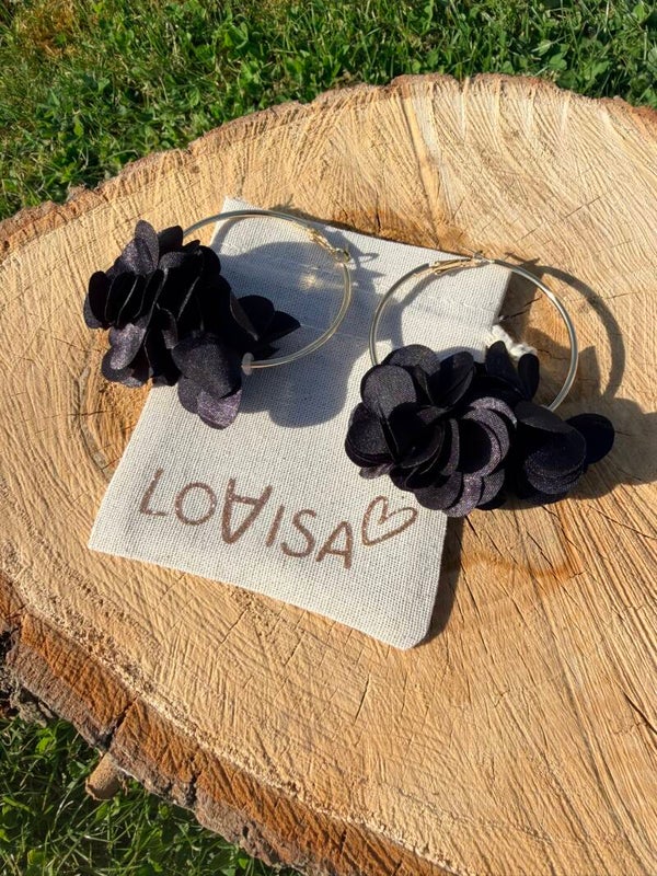 Boucles d’oreilles créoles dorées avec pompon noir