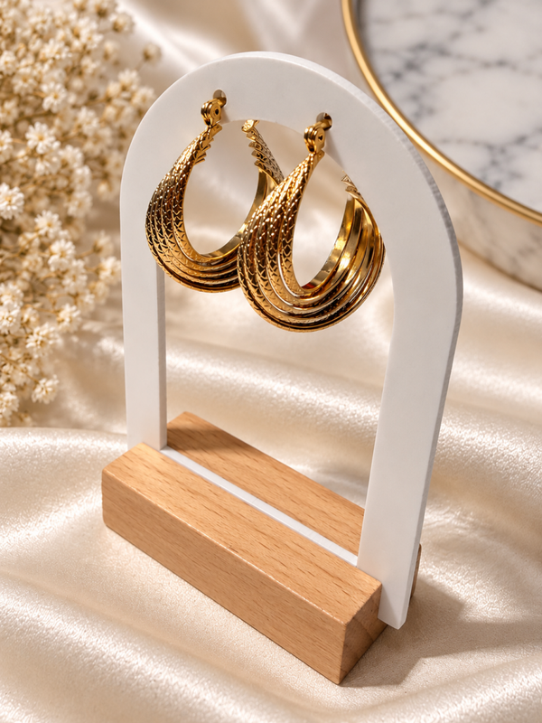 Gouden oorbellen met slangenprint
