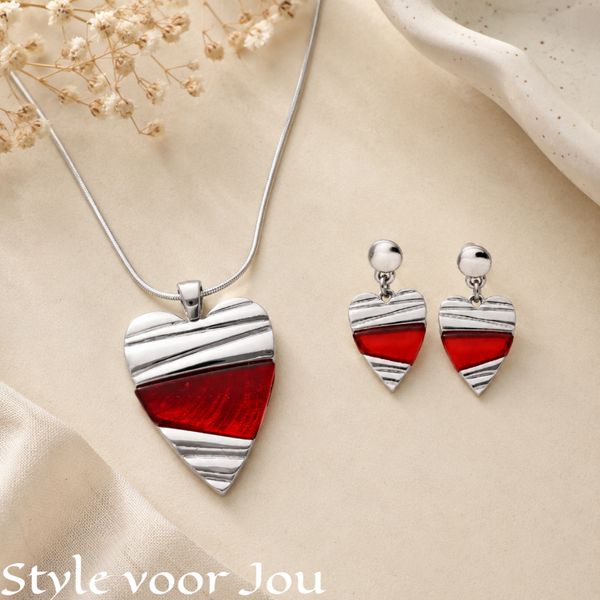 Elegante sieradenset bestaande uit een opvallende halsketting en bijpassende oorbellen🌸