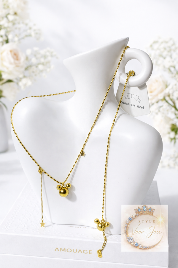 Goudkleurige sieradenset met speelse details