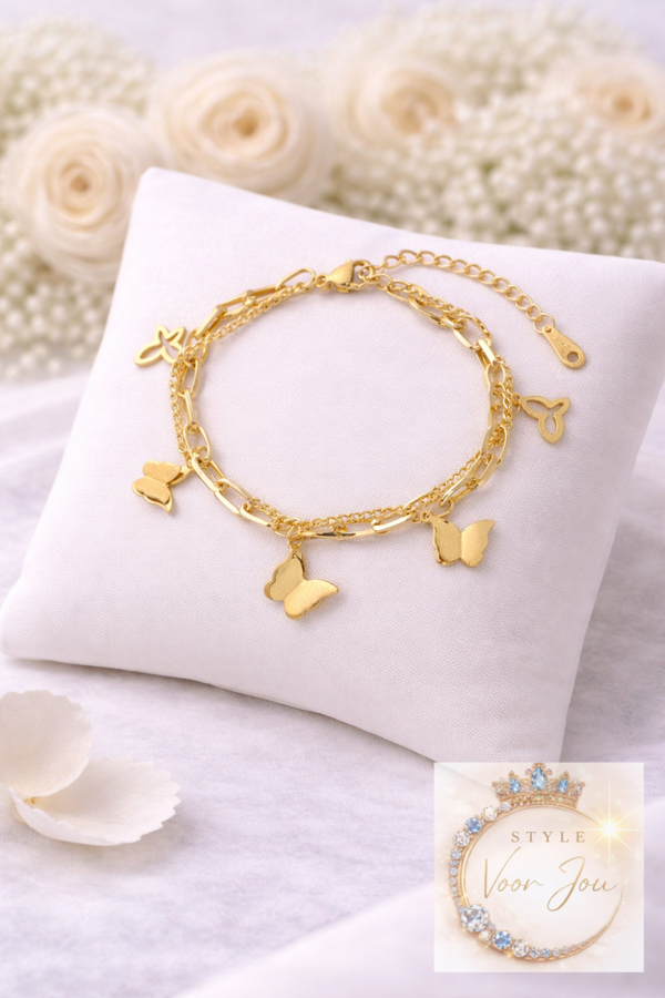 Goudkleurige armband met vlinders