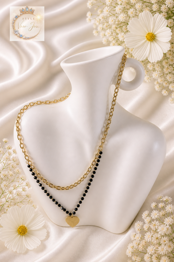 Gelaagde ketting met zwarte kralen en hartje – stijlvol contrast
