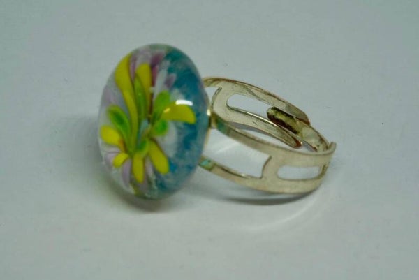Ring met geel/roze bloem