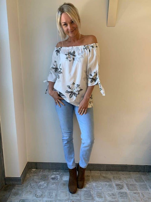 Off shoulder white flower