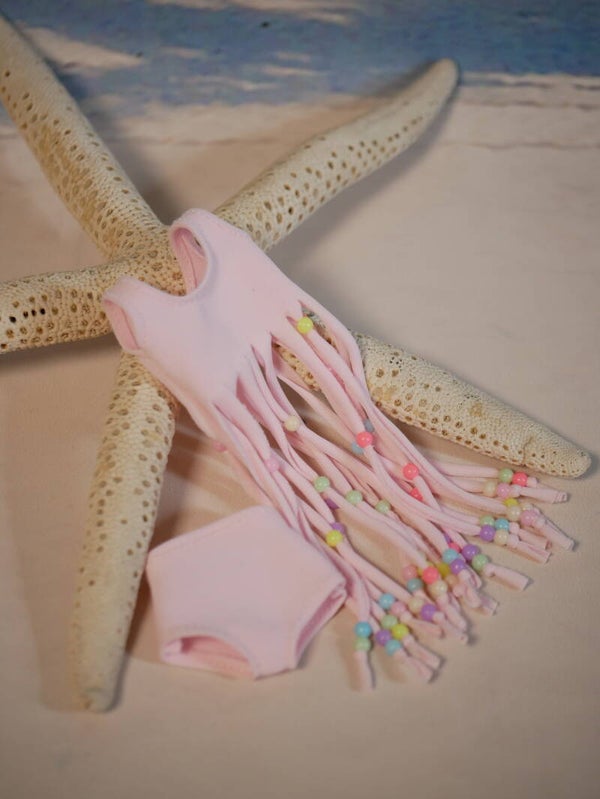 Cute beaded beach outfits with stretch fabrics./ Pink