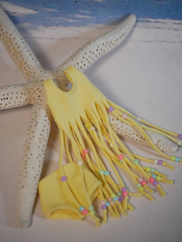 Cute beaded beach outfits with stretch fabrics./ Yellow