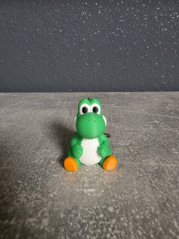 Porte-clés petit dinosaure vert – style kawaii 🦖💚