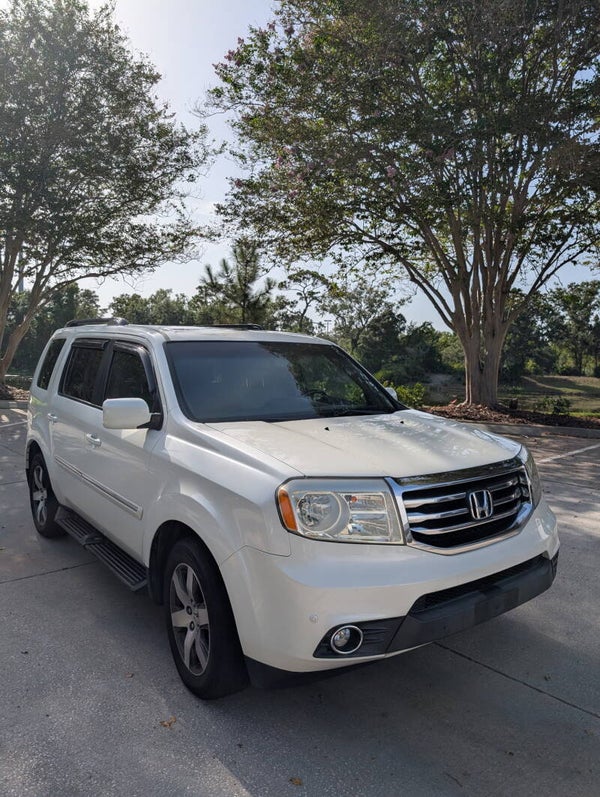Honda Pilot Touring 4WD 2013 (196,454 mi)