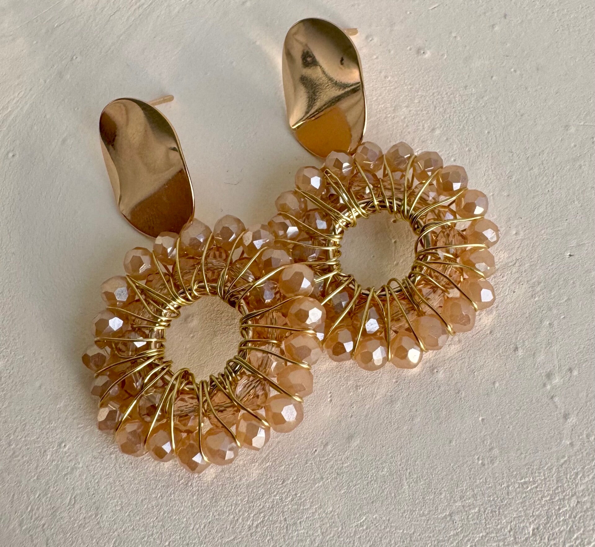 Salmon faceted beads with gold