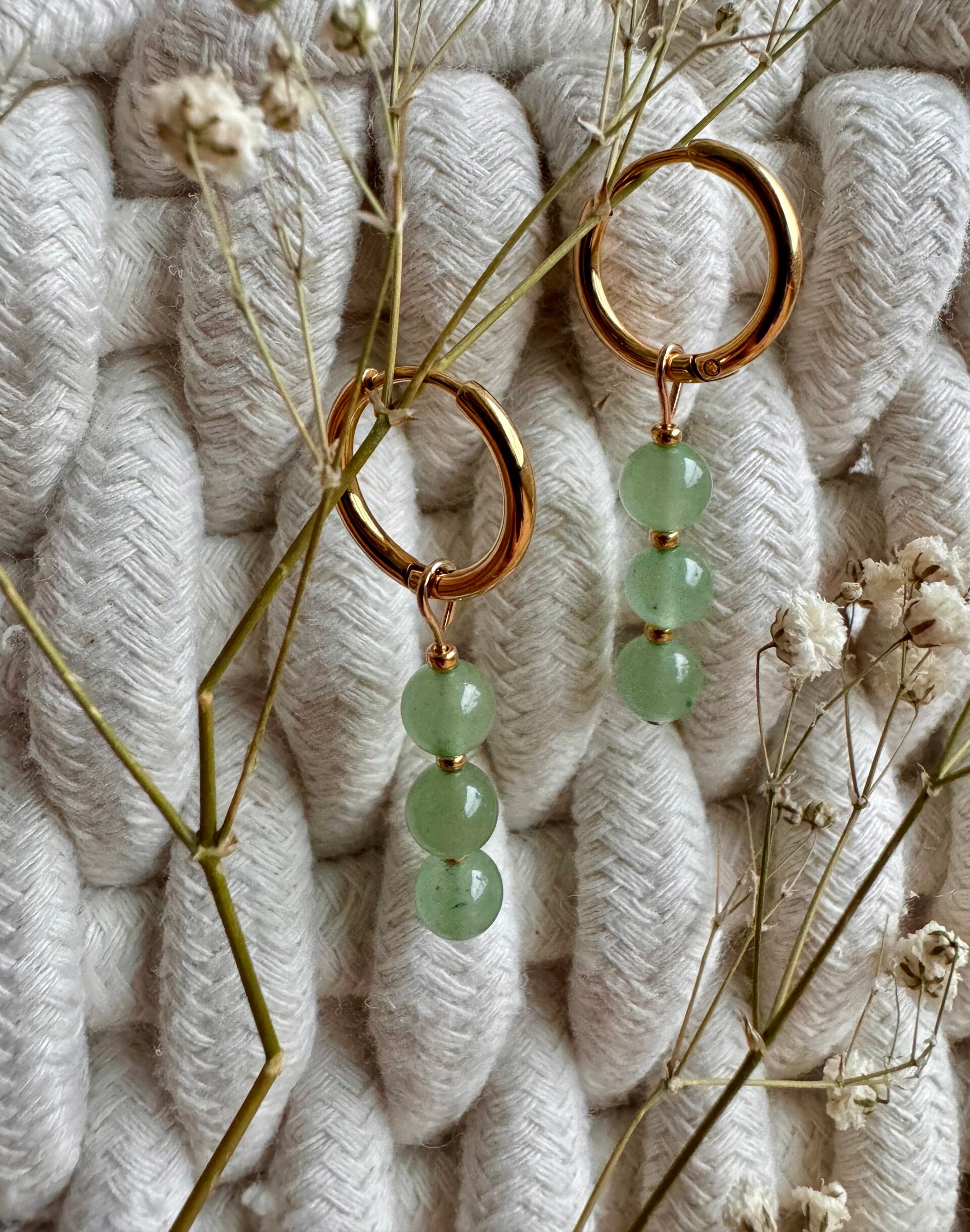 Green aventurine with golden loops
