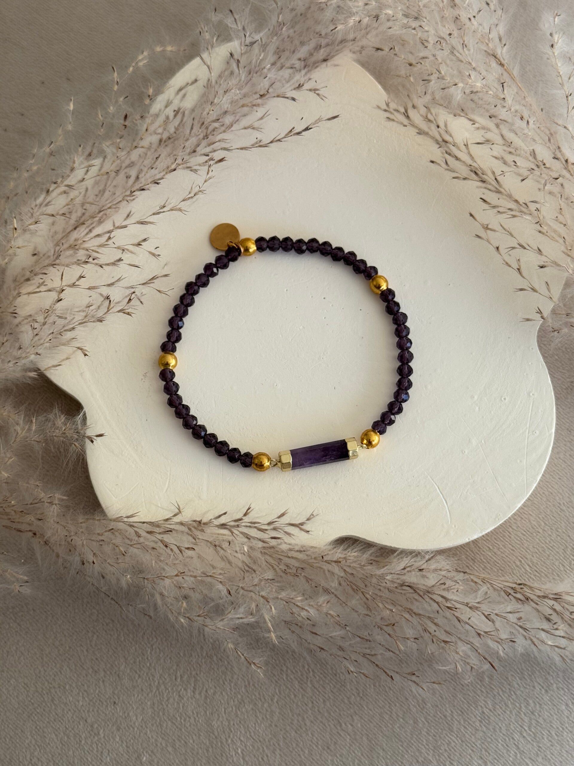 Amethyst with some other purple glass beads