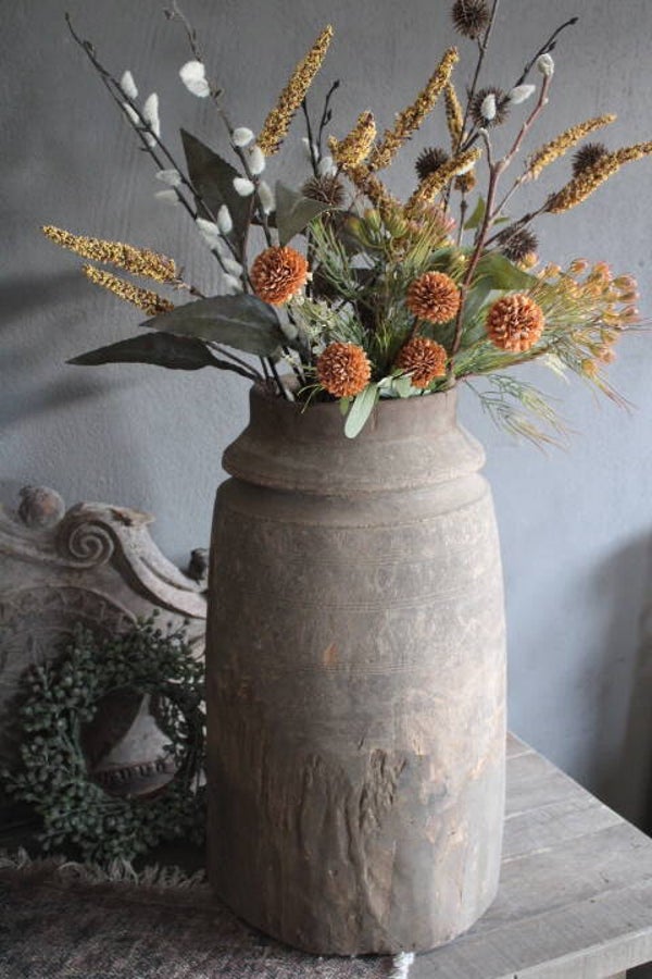 Oude houten naga pot uit India