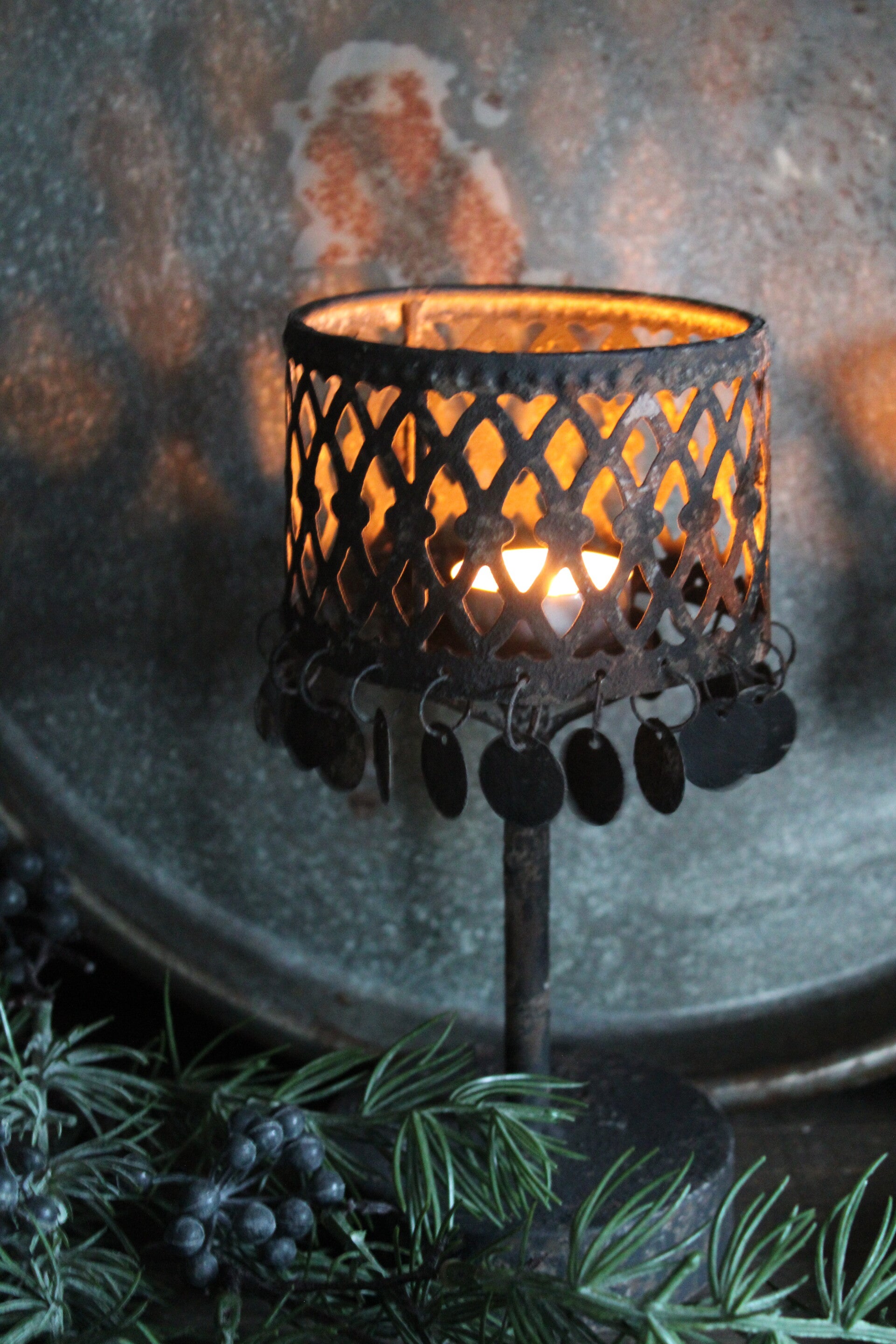 Metalen kandelaar met muntjes