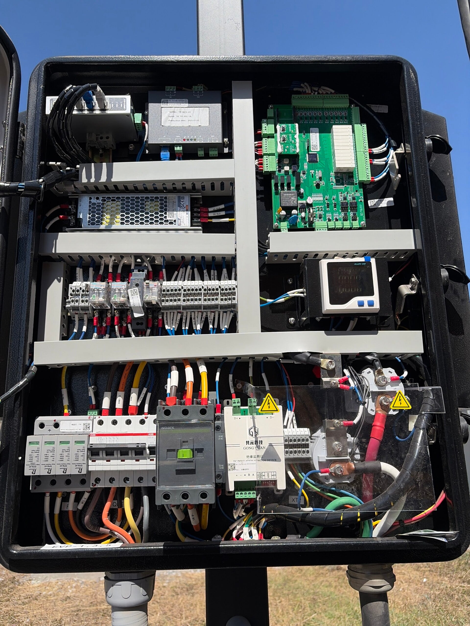 Electrical control cabinet with breakers, contactors, and routed wiring from the VDZ project gallery