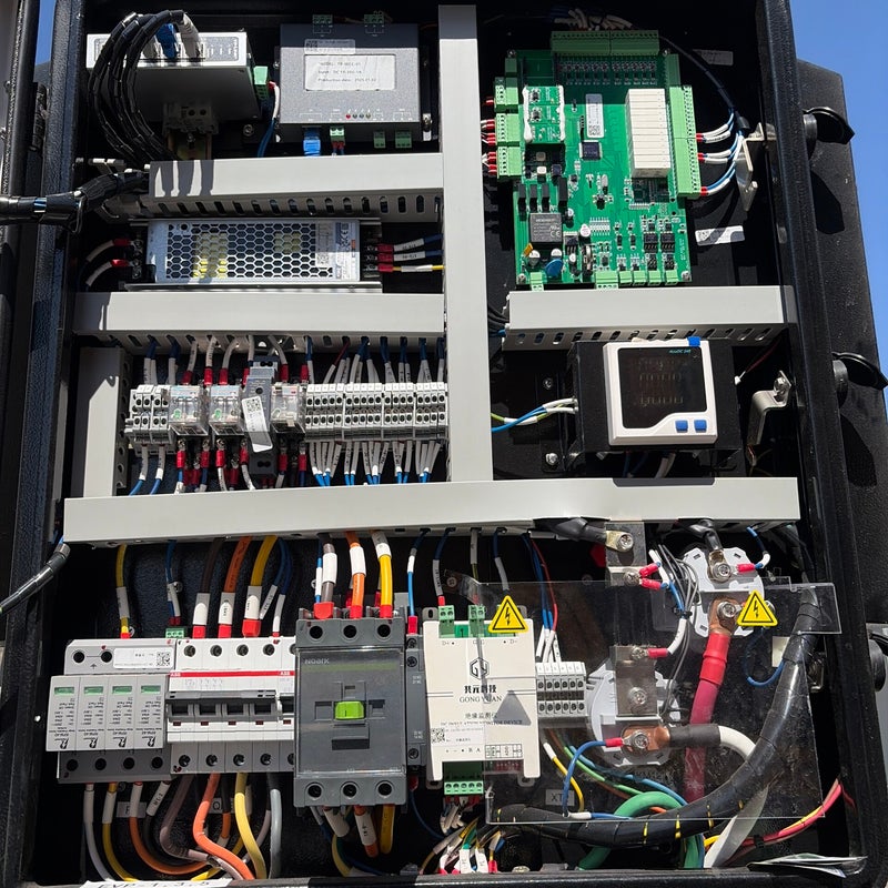 Electrical control cabinet with breakers, contactors, and routed wiring from the VDZ project gallery