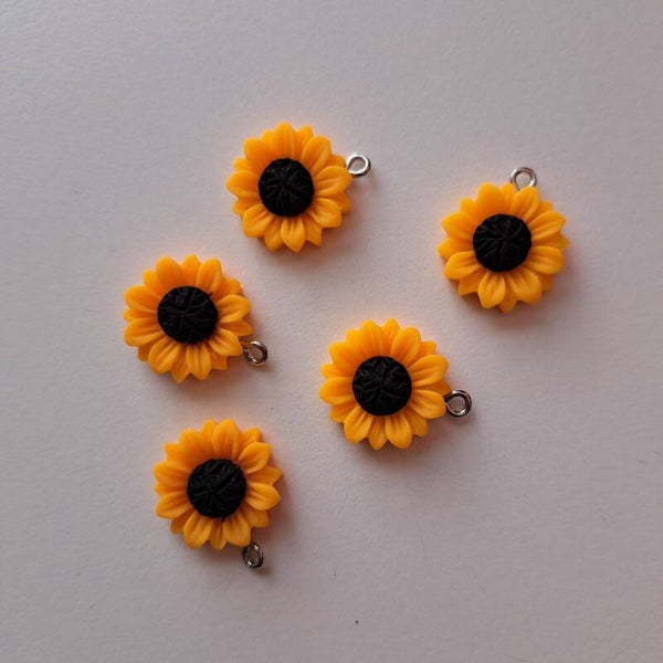 5 zonnebloem bedels voor Janet