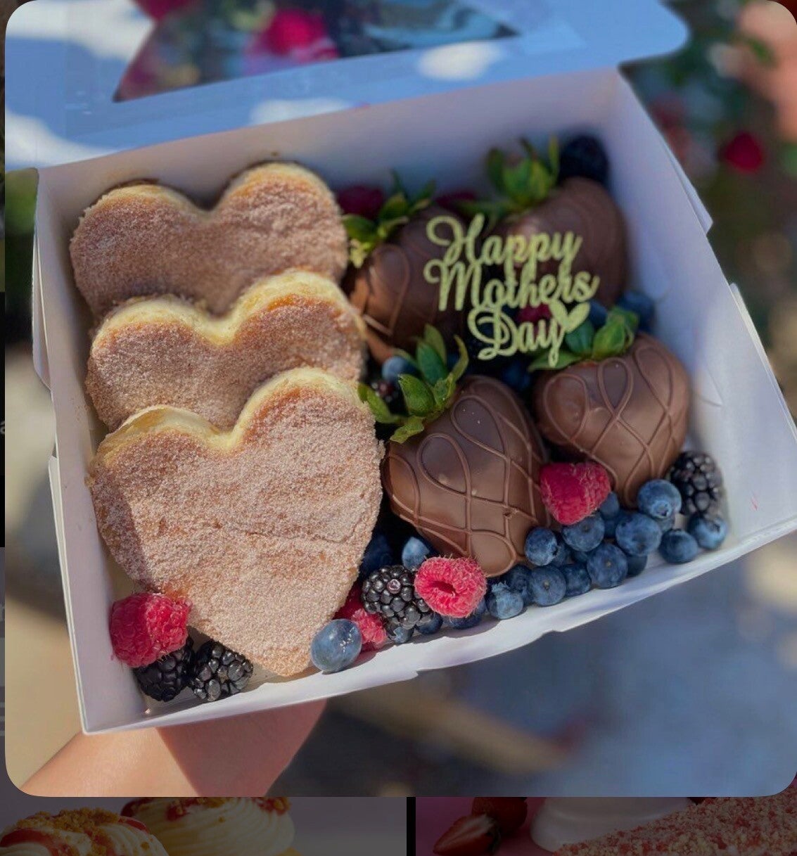 Mothers Day Churro cheesecake with chocolate covered strawberries