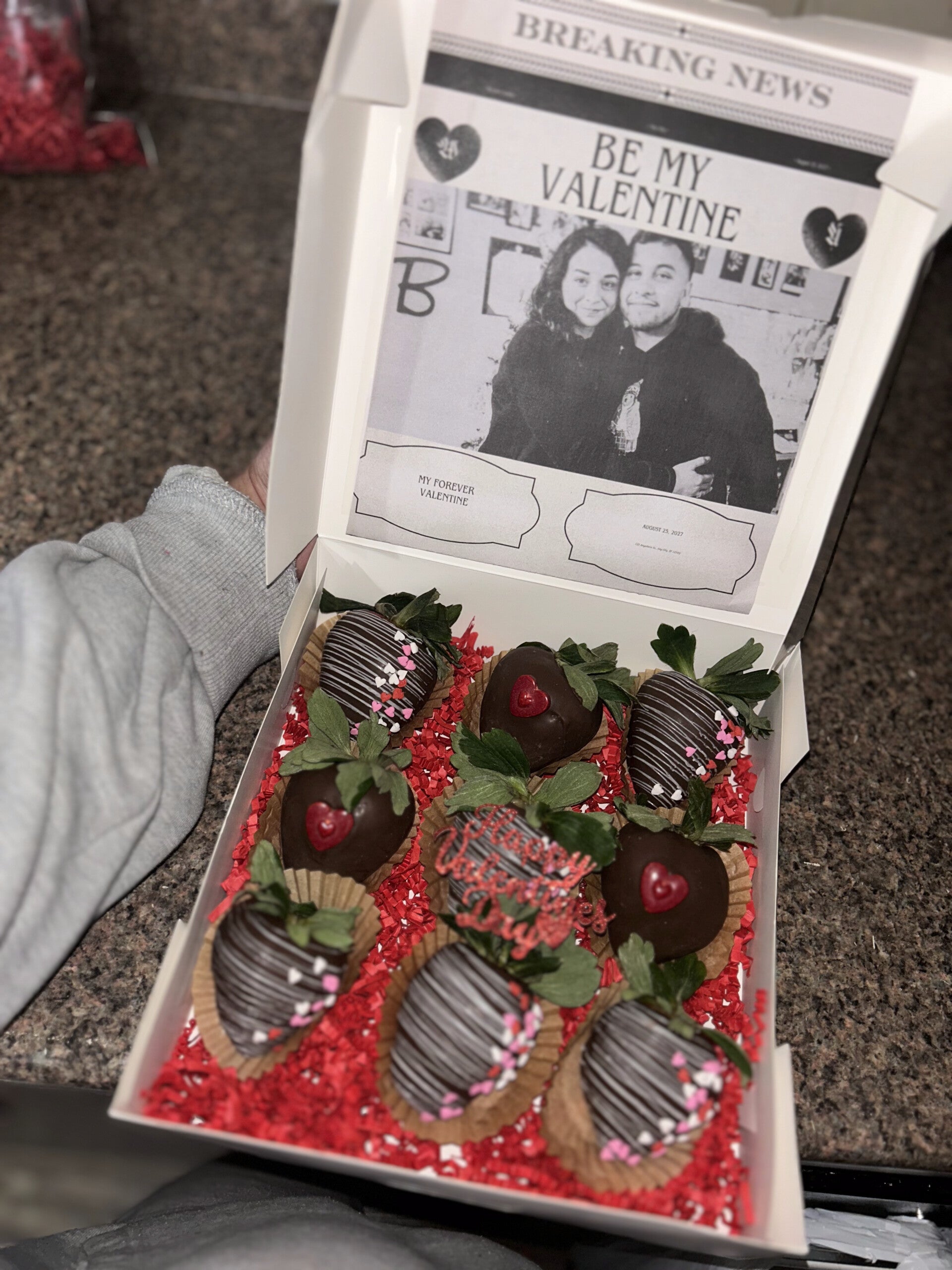 Newspaper chocolate covered strawberry box