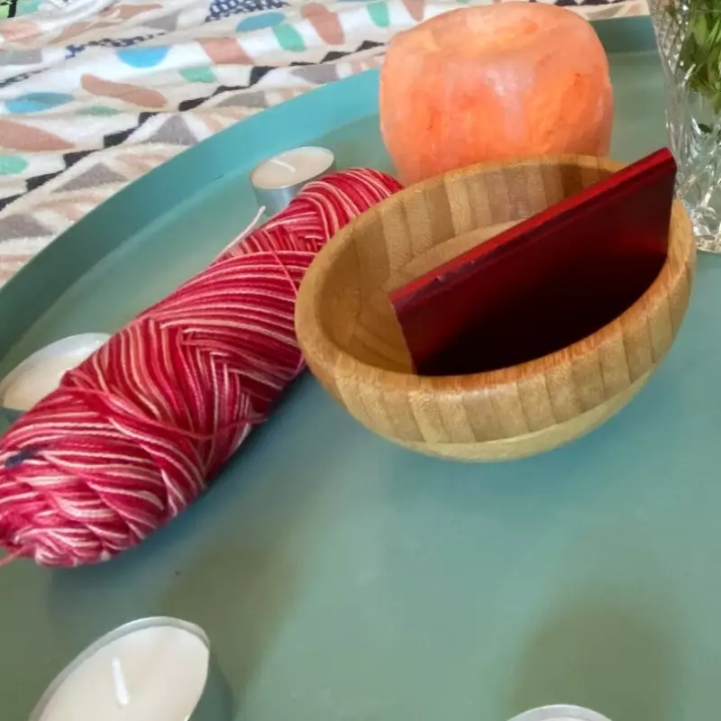 Motherblessing altar with beats, candles and rope