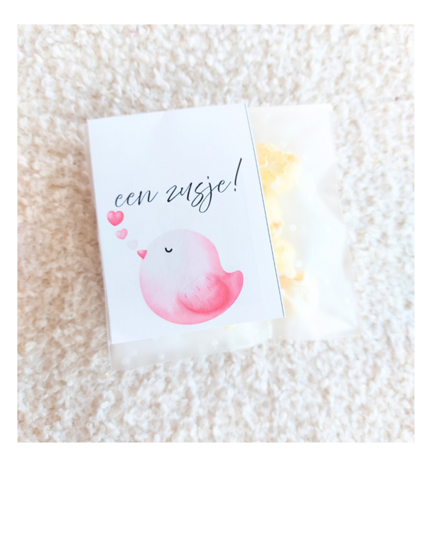 Een zusje, vogel label