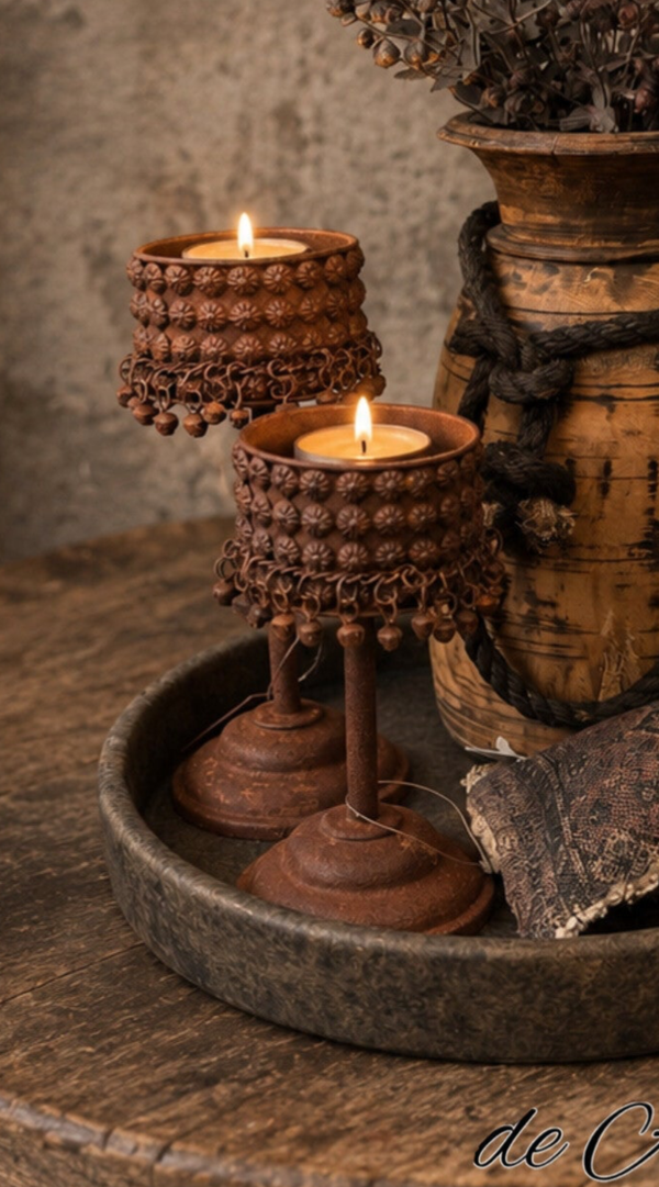 Roest waxinehouders met belletjes