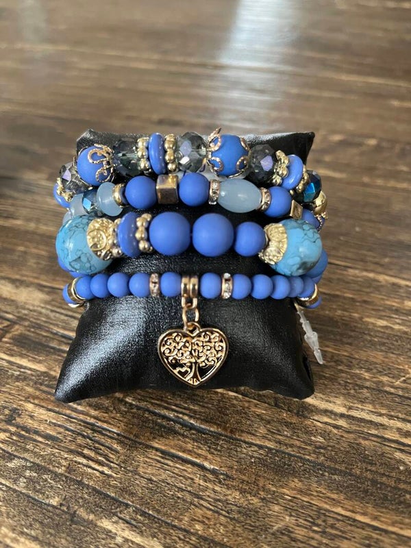 Setje van 4 armbandjes - blauw