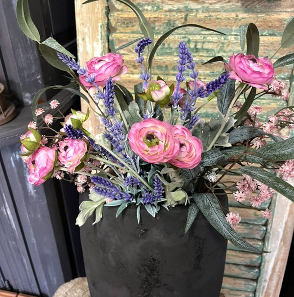 Paars/roze boeket met ranonkels