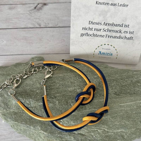 INFINITY Knoten Armband, dunkelblau.gelb