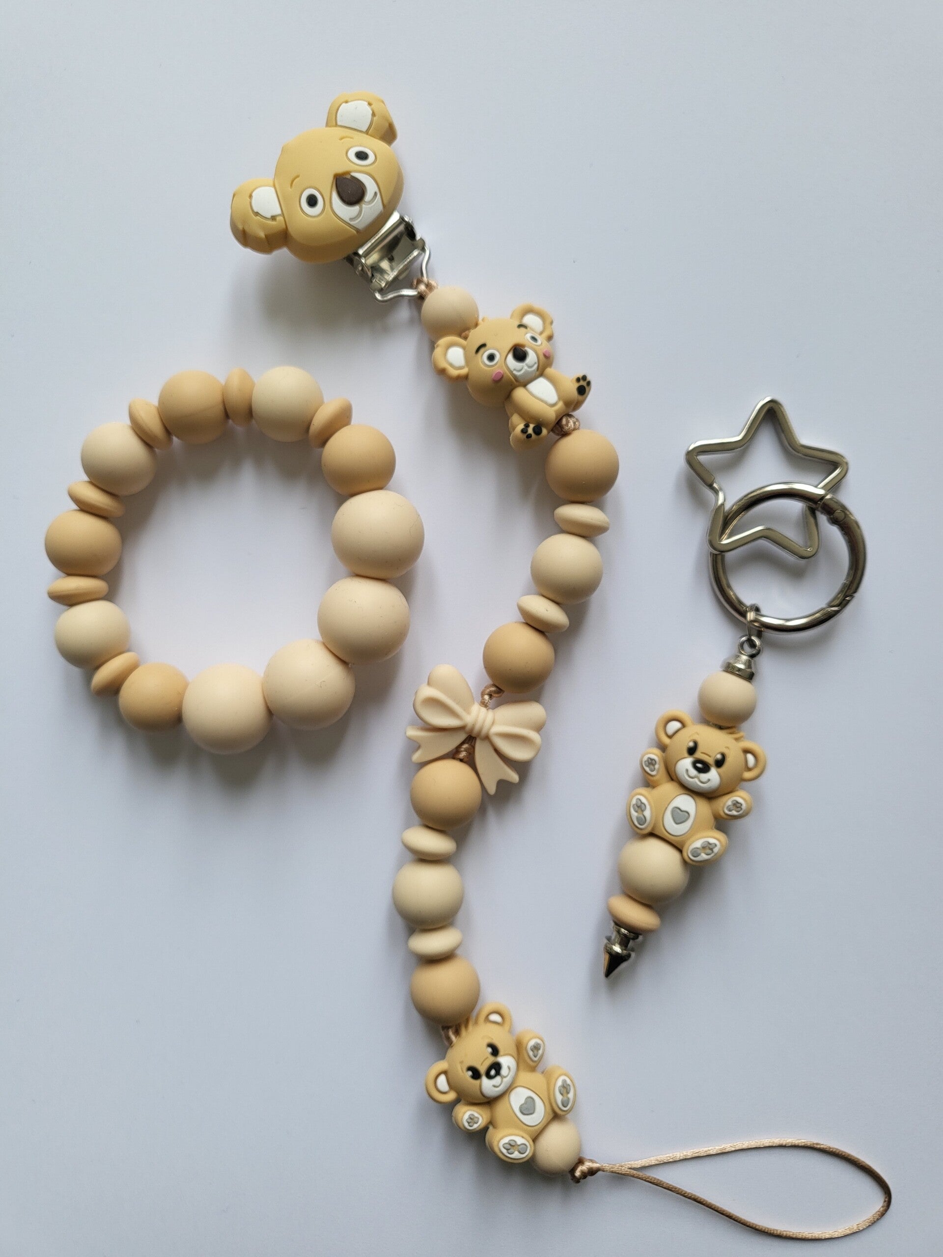 Speenkoord en bijtring met koalabeertje en teddybeertje in zand-kleur en beige.