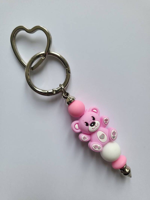 Tashanger met teddybeertje in fuchsia-roze en wit.