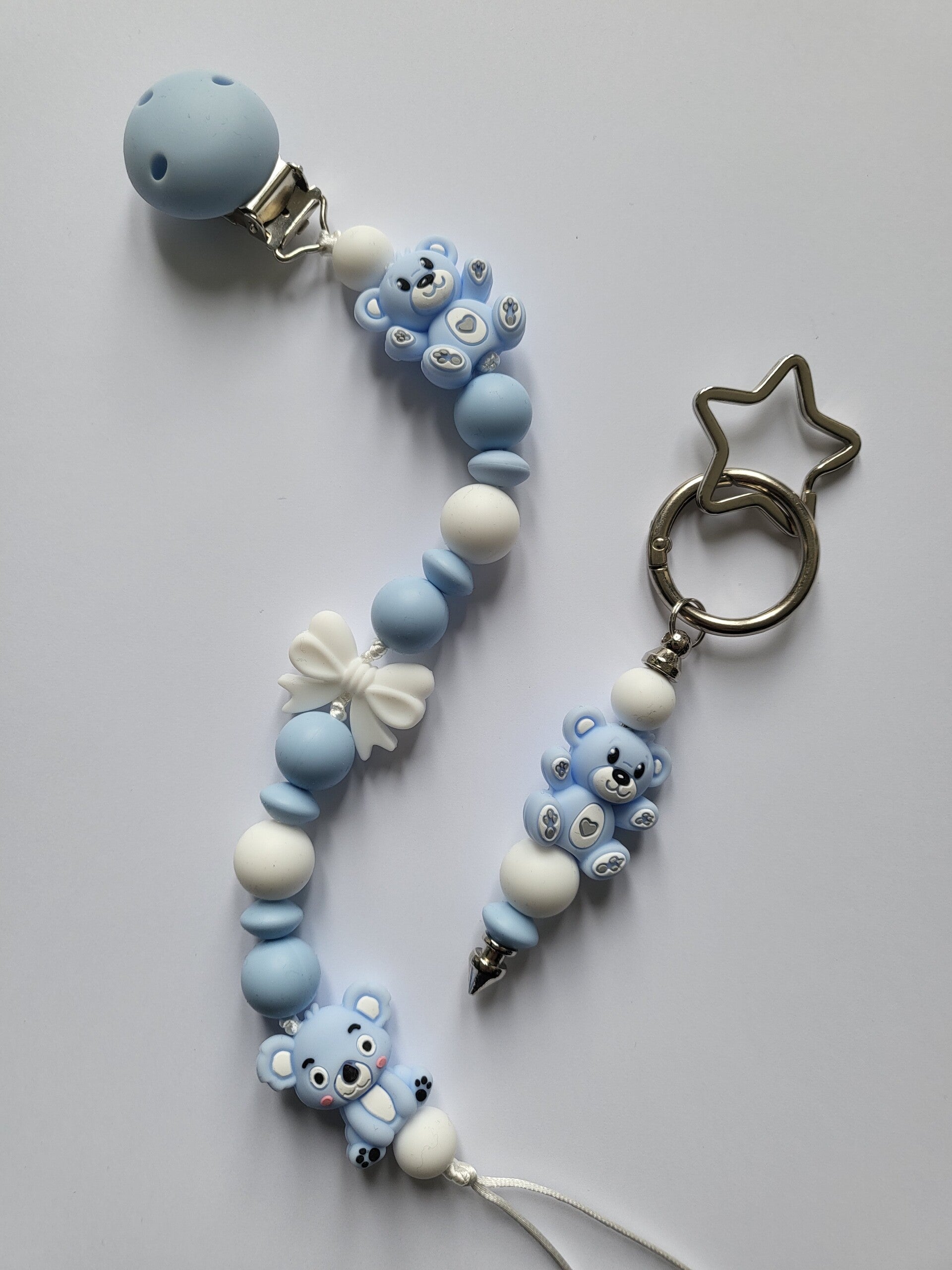 Speenkoord met teddybeertje en koalabeertje in blauw en wit.
