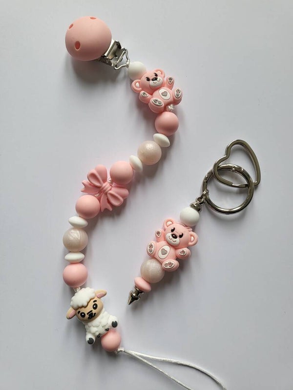 Speenkoord met schaapje en teddybeertje in parelmoer-roze, lichtroze en wit.