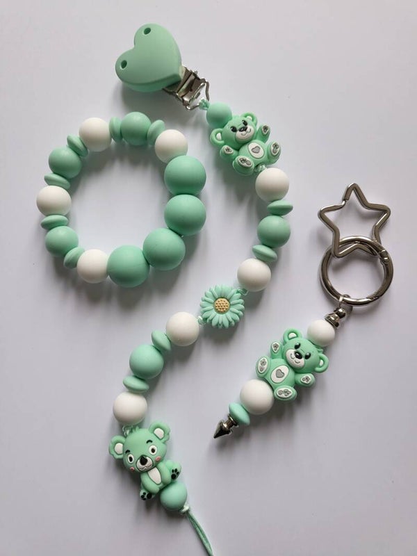 Speenkoord en bijtring met teddybeertje en koalabeertje in mintgroen en wit.