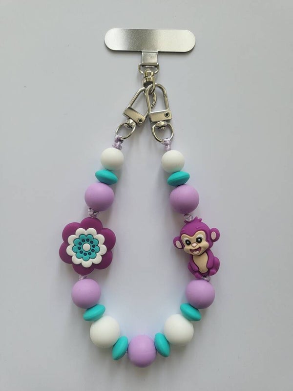 telefoonkoord met aapje in lila, turquoise en wit.