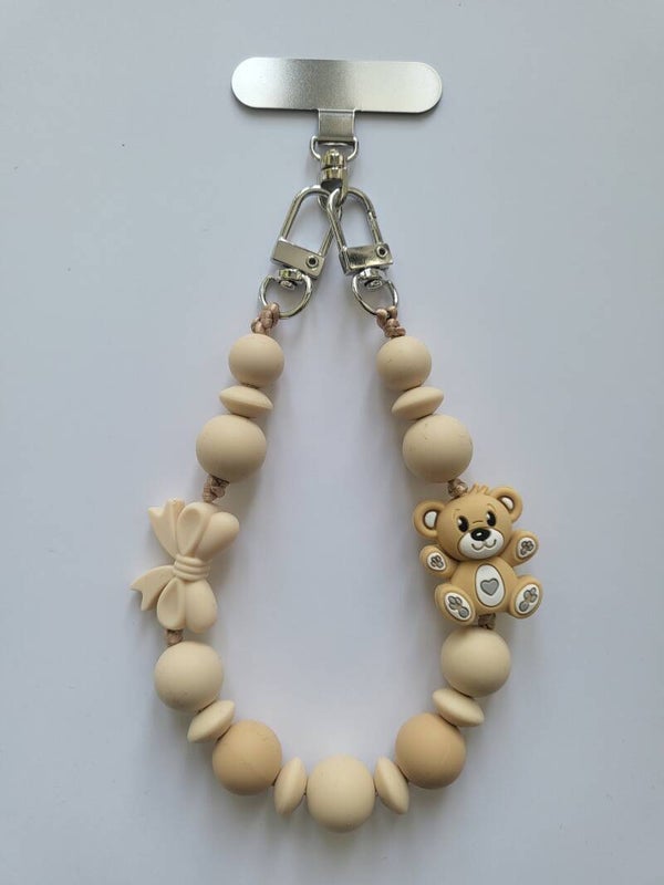 Telefoonkoord met teddybeertje in zand-kleur en beige.