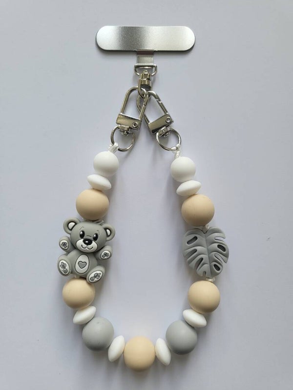 Telefoonkoord met teddybeertje in lichtgrijs, beige en wit.
